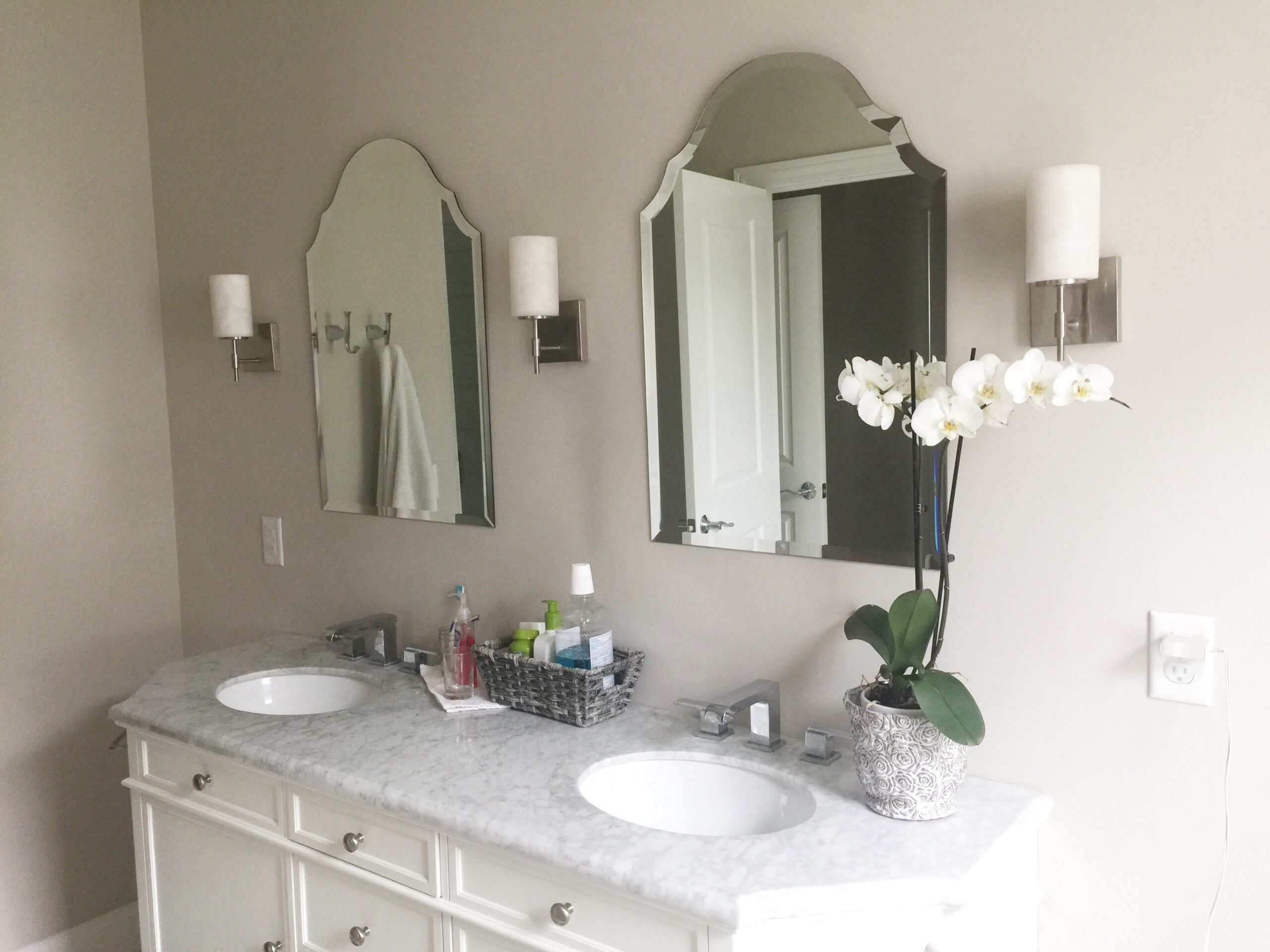 Gathering of Lines Home Design marble vanity, arched mirror, decor ideas